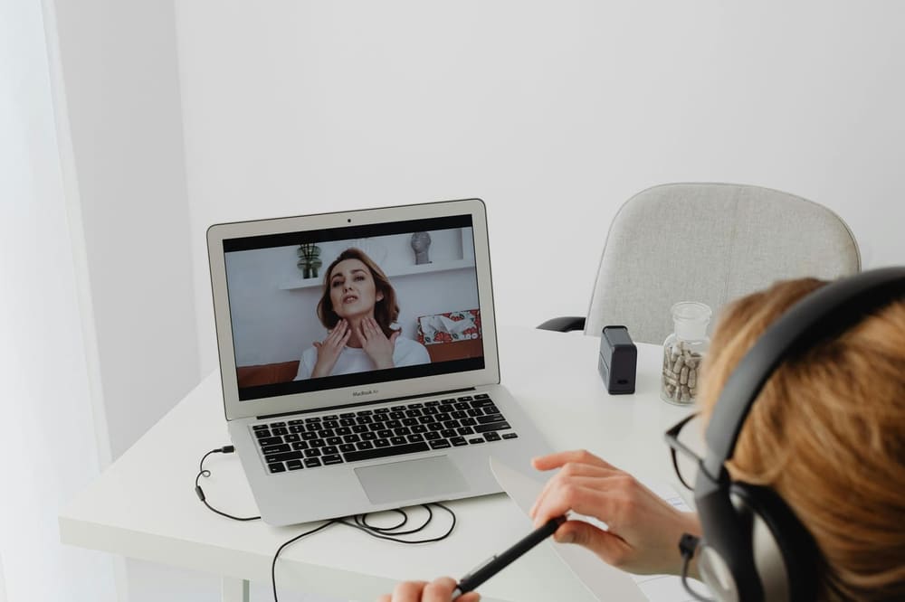 Therapist on a video session with a headset